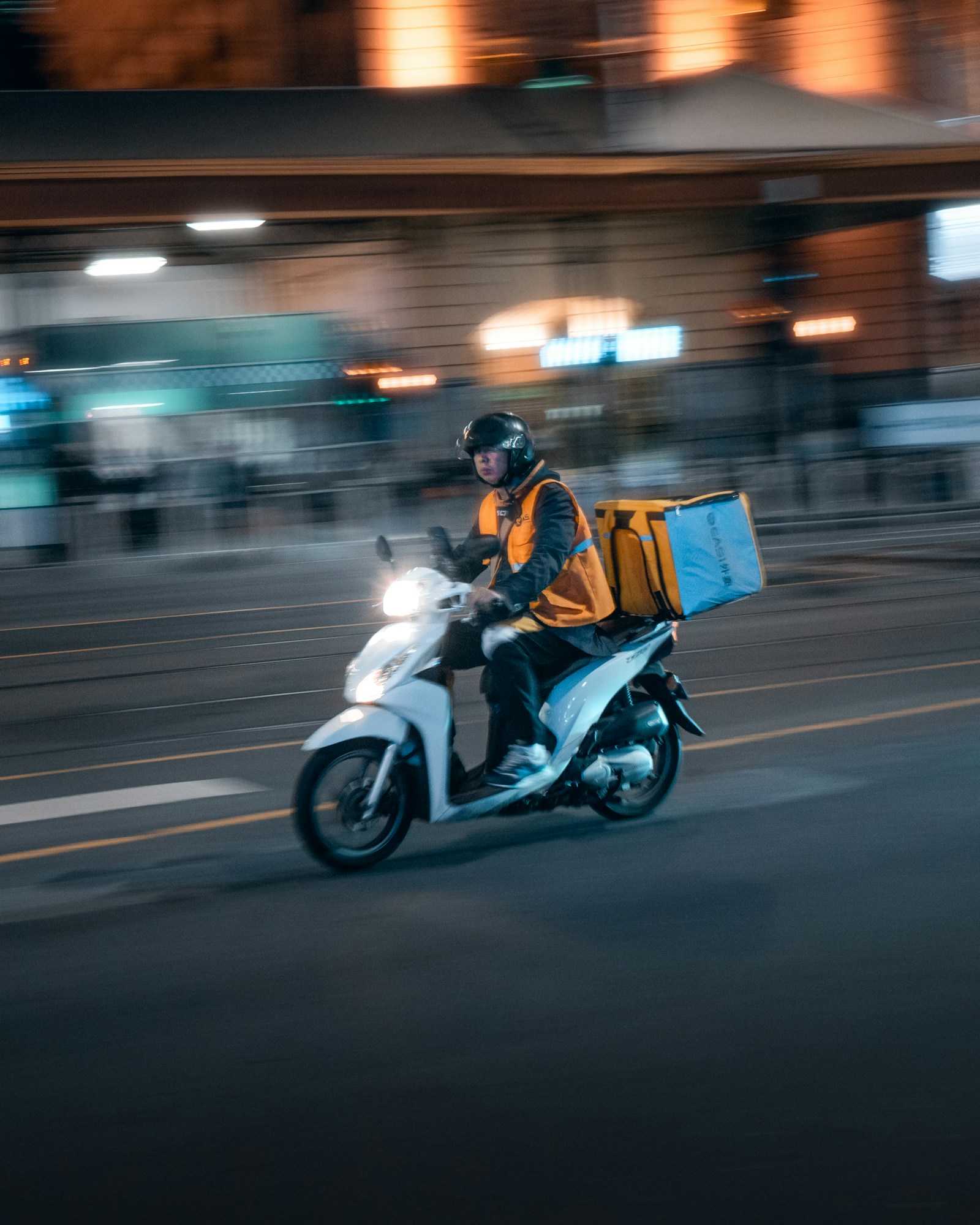 AVDAN delivery rider en route at night